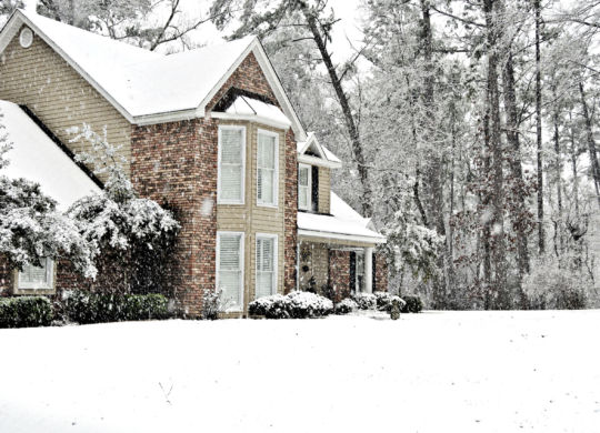 Executive,Home,Covered,With,A,White,Snow,Blanket,On,A